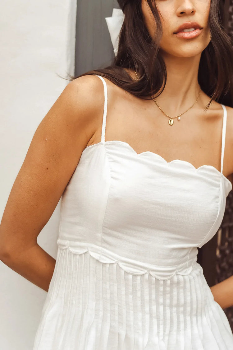 Sleeveless mini dress in white 