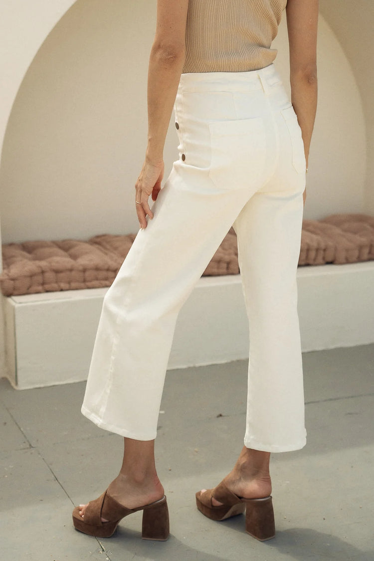 Two back pockets wide legs in cream 