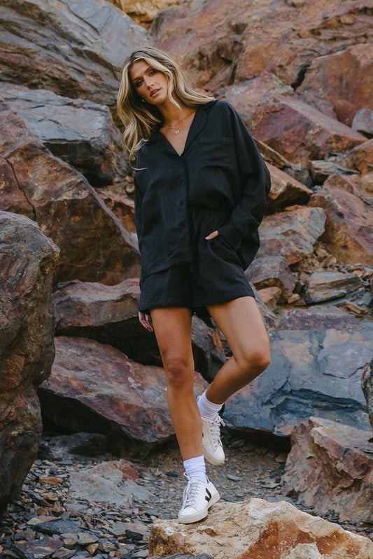 One side pocket button up top in black 
