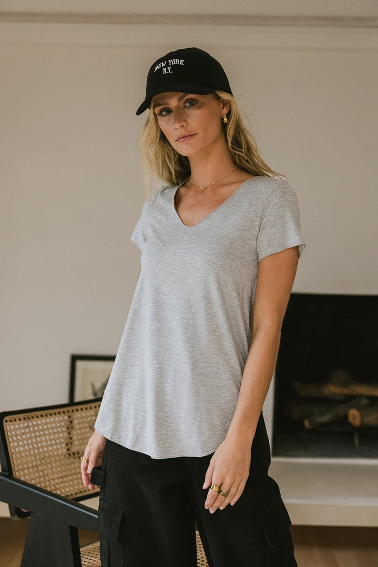 Knit top in grey paired with a cargo pant 