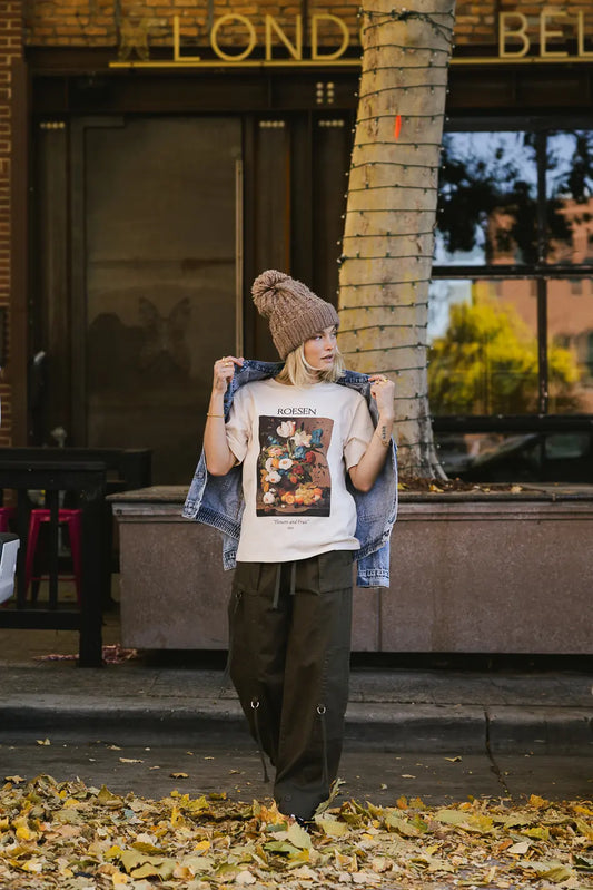 Graphic tee paired with a olive cargo pant 