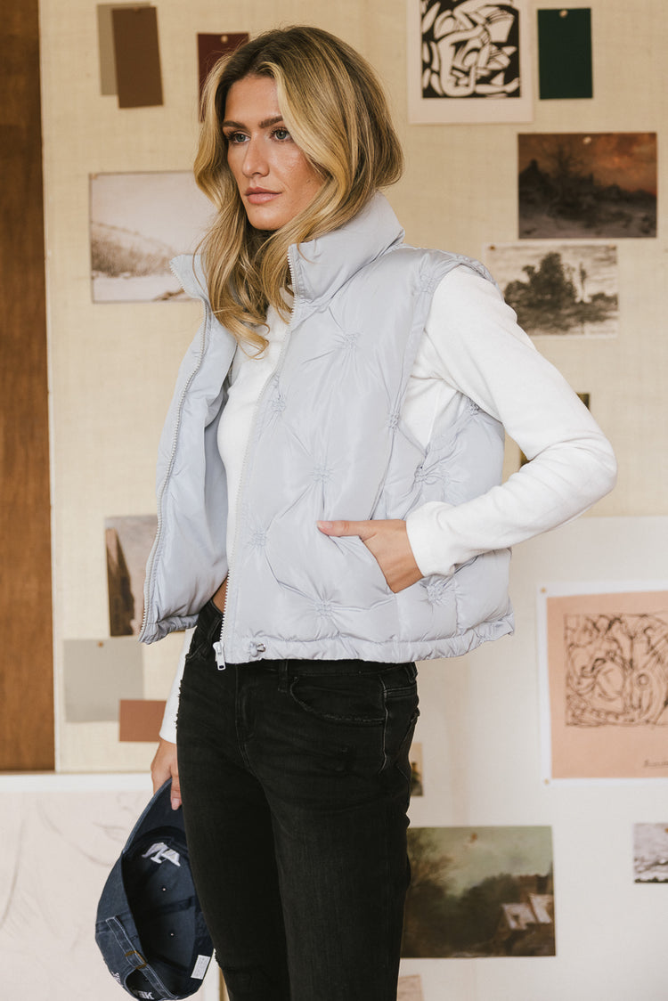 blue puffer vest with pockets