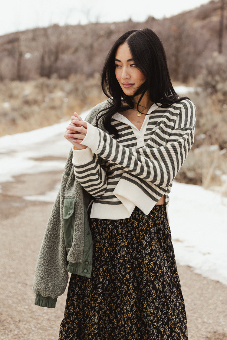 green striped long sleeve knit top