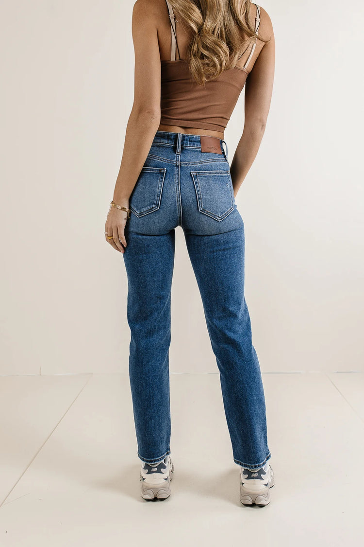 Two back pockets straight leg jeans in medium wash 