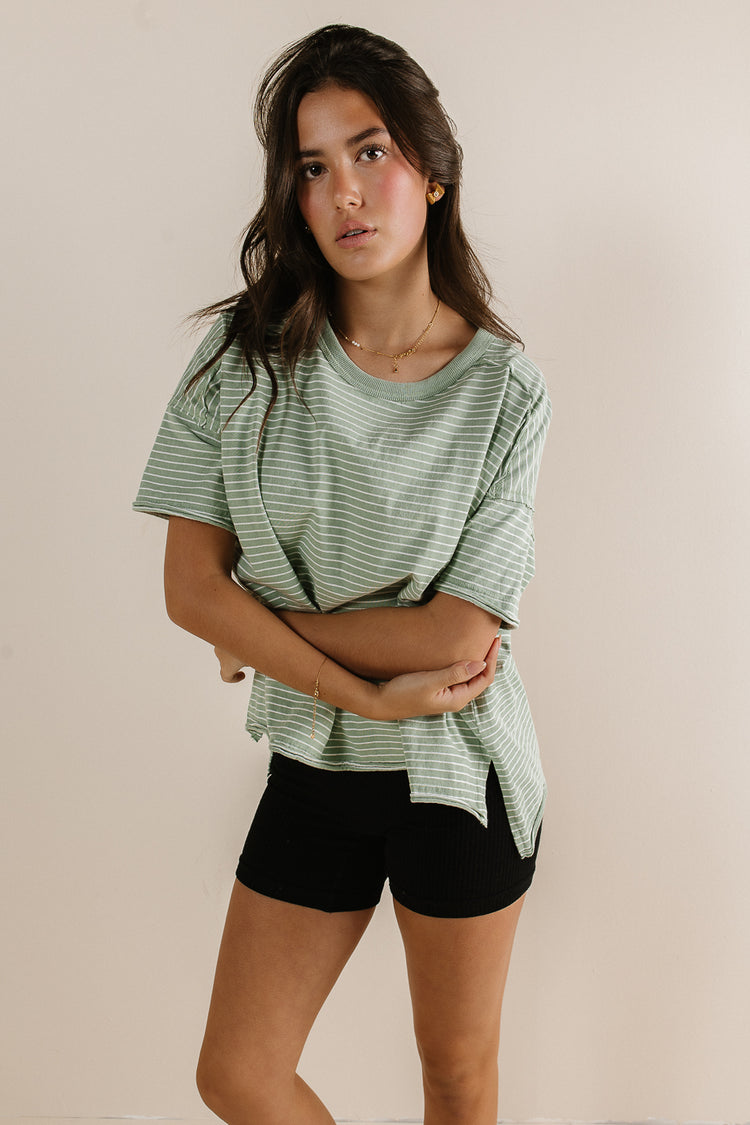 short sleeve top with exposed seams