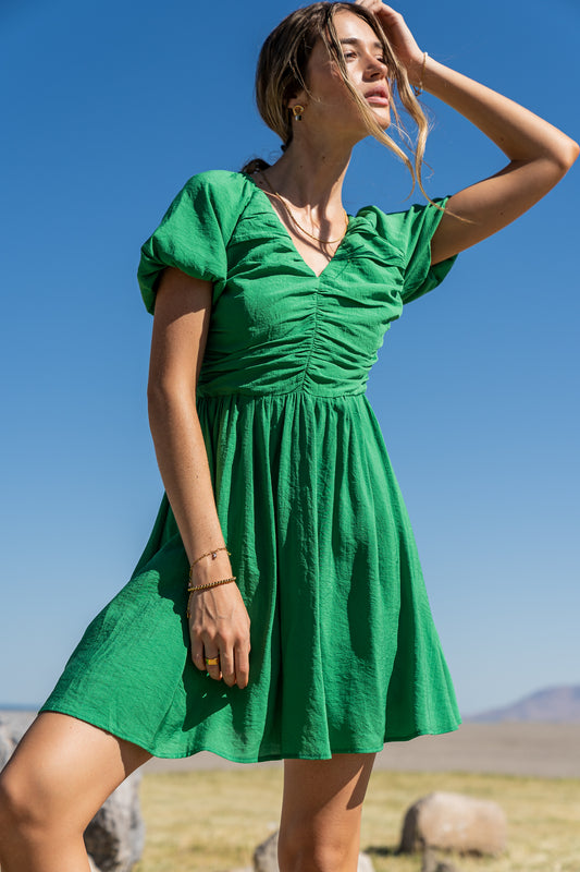 short sleeve mini dress in green with slight puff sleeve