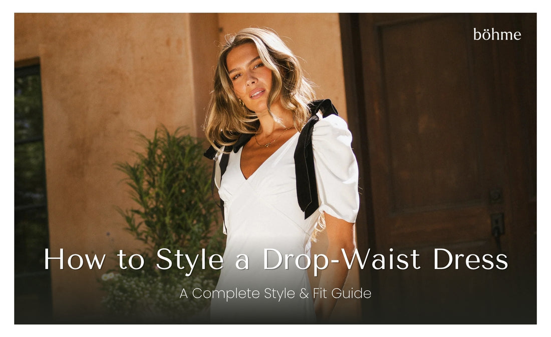 Woman in white v-neck drop-waist midi dress with puff sleeves and black velvet shoulder bow