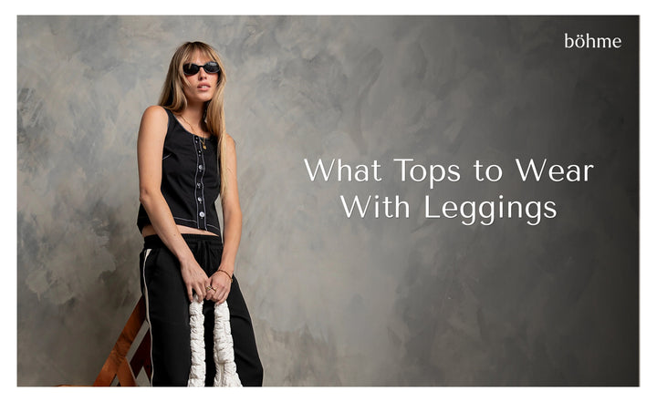 Woman in black button-front tank top and matching pants