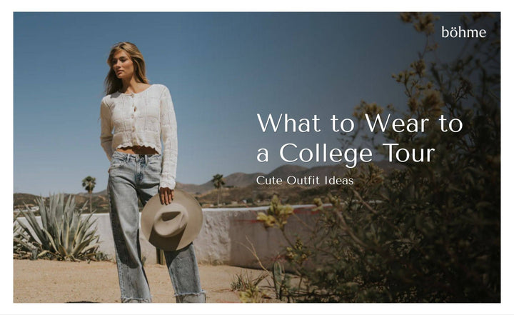 Woman wearing a white cropped cardigan with wide-leg jeans and holding a wide-brim hat