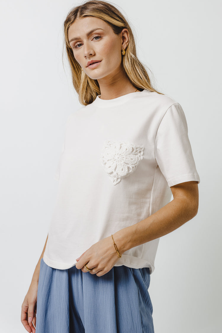 white t-shirt with crochet detail