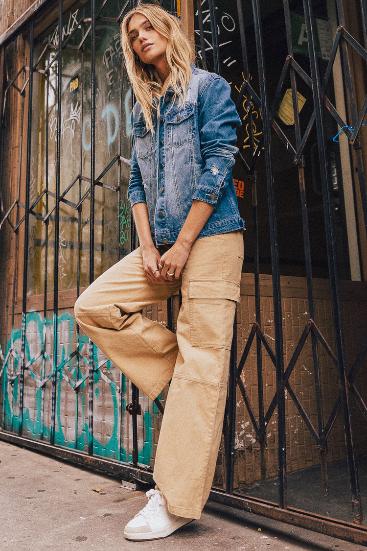 denim jacket paired with cargo pants