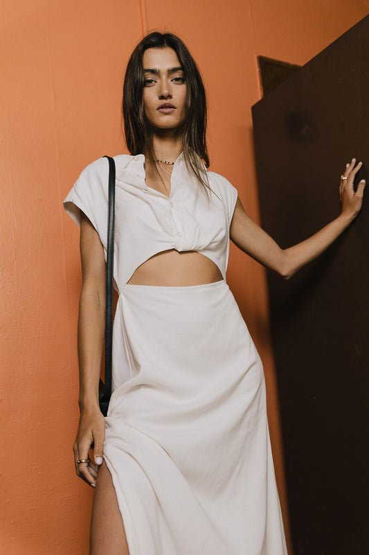 White short sleeve dress with cut out stomach area with slit up one side