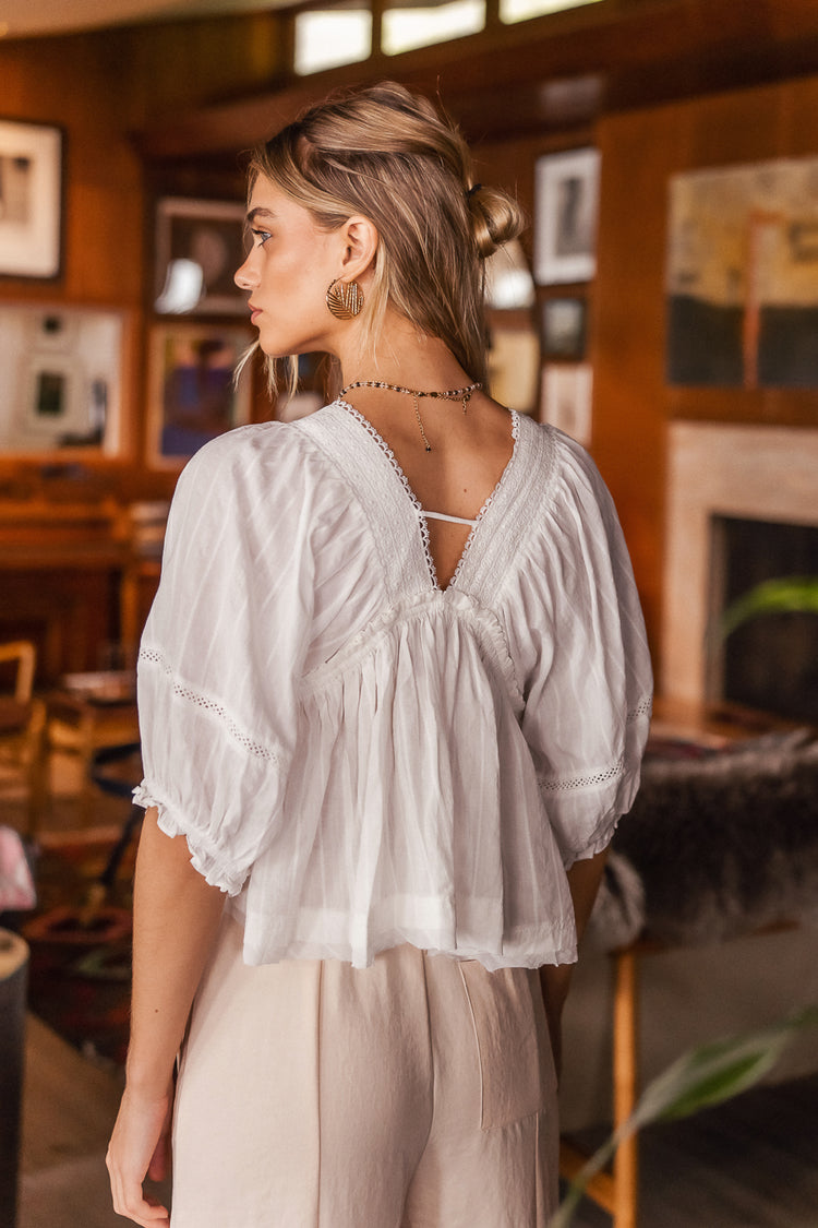 white blouse with lace detail
