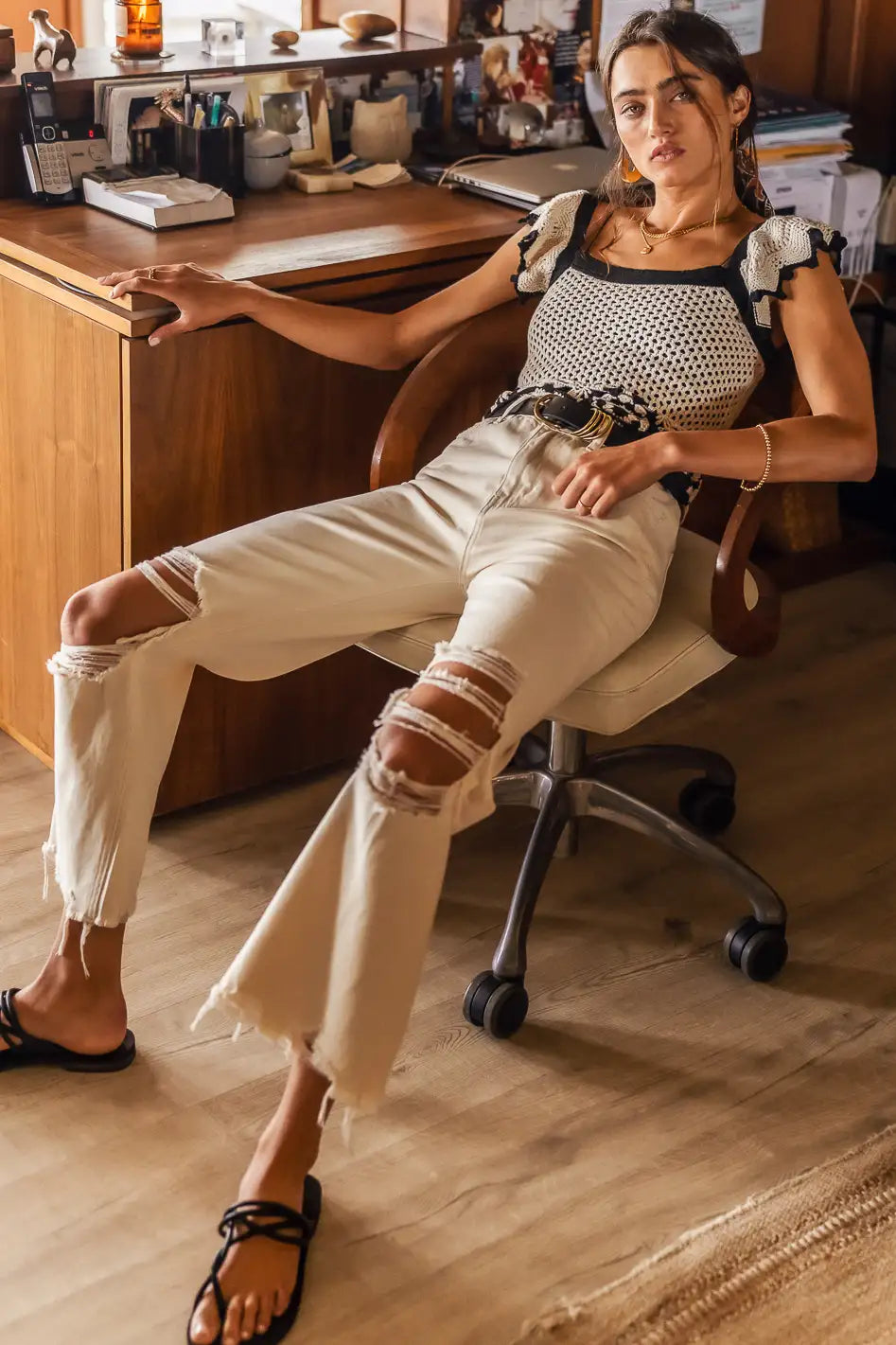 black and white crop top with white distressed jeans