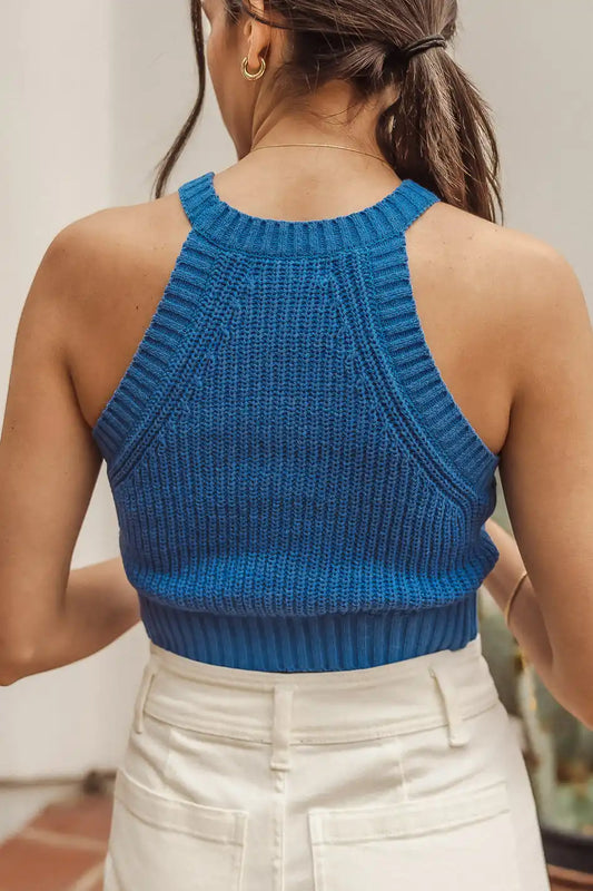 backside of blue sleeveless crop top