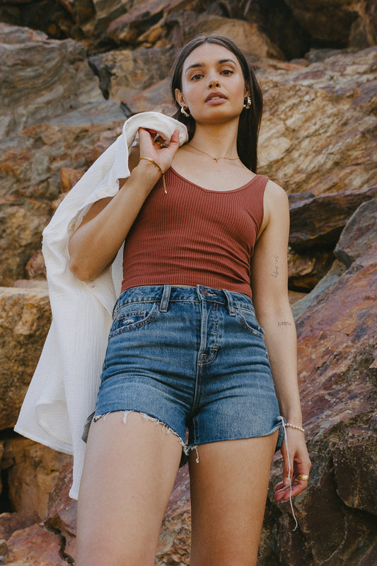 washed cognac tank top with a white button up and denim shorts