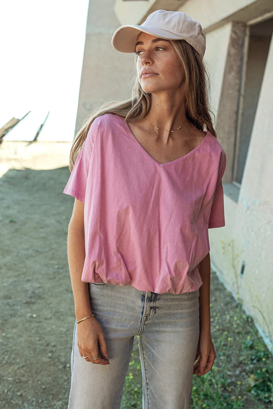 pink top with bubble hem