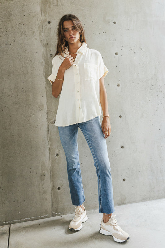 cream button up with short sleeves
