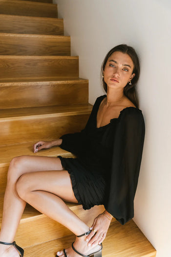 long sleeve mini dress with ruched bottom