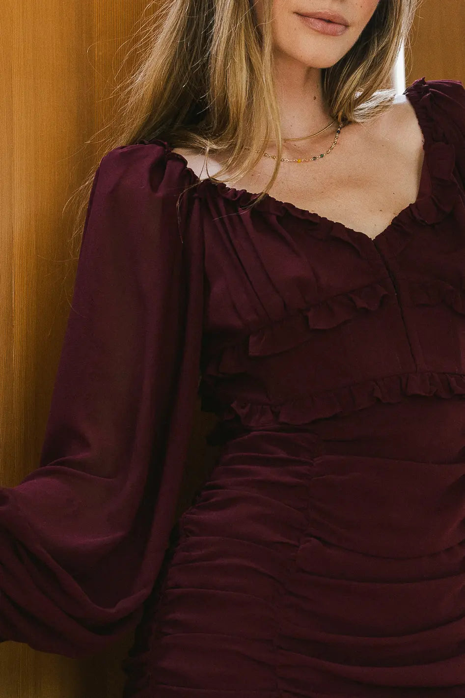 wine dress with ruffle detail