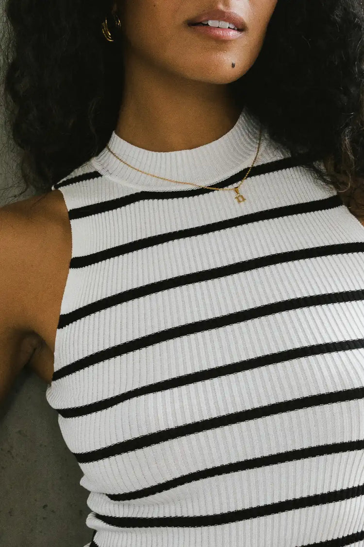 Ribbed mock neck stripped top in white and black 