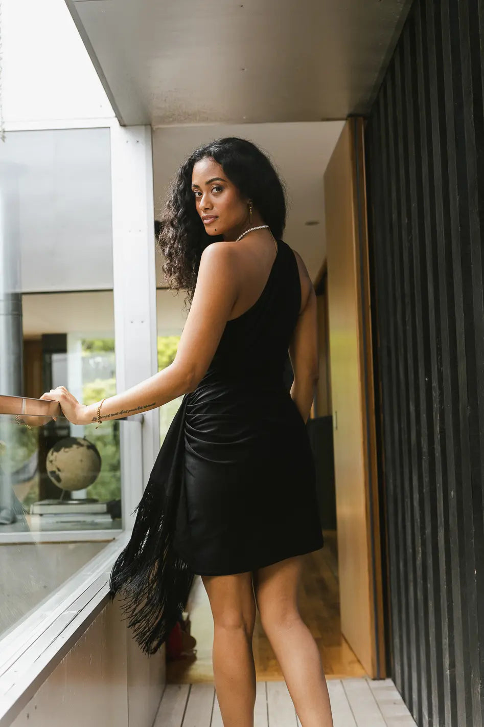 Off sleeve left shoulder mini dress in black 