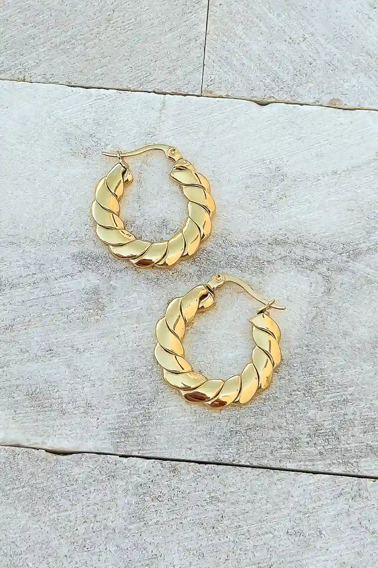 gold open earrings with twisted detail