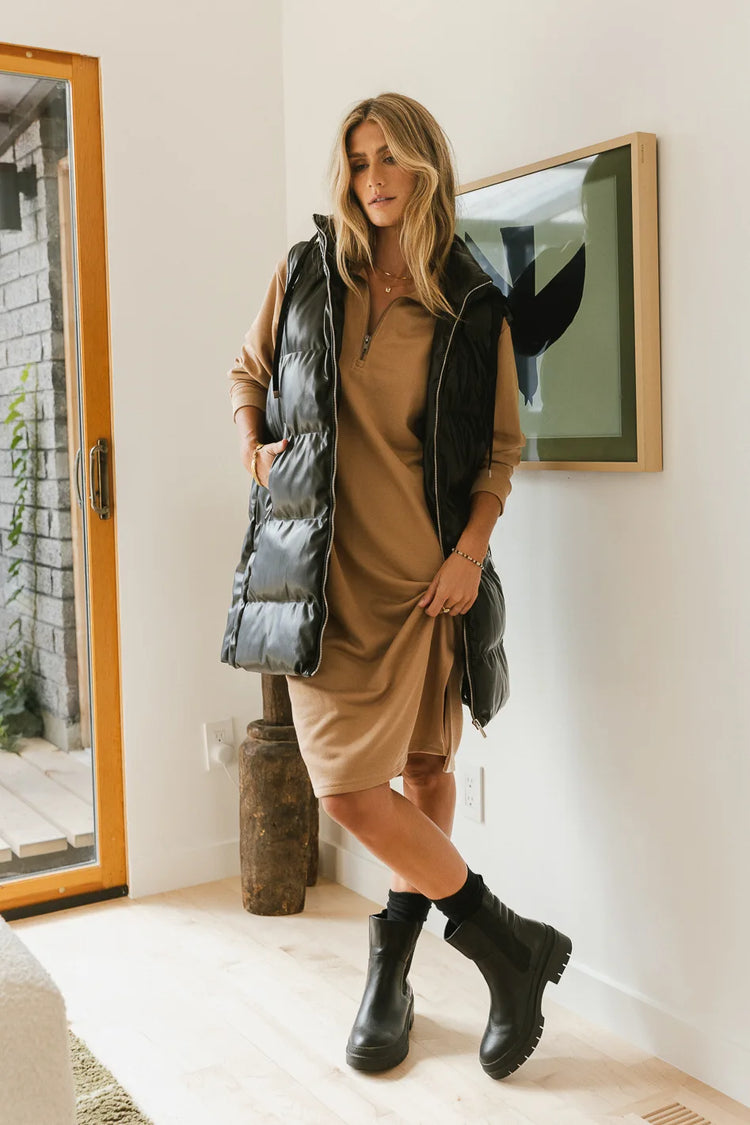Quarter zip dress in mocha paired with a long vest in black 
