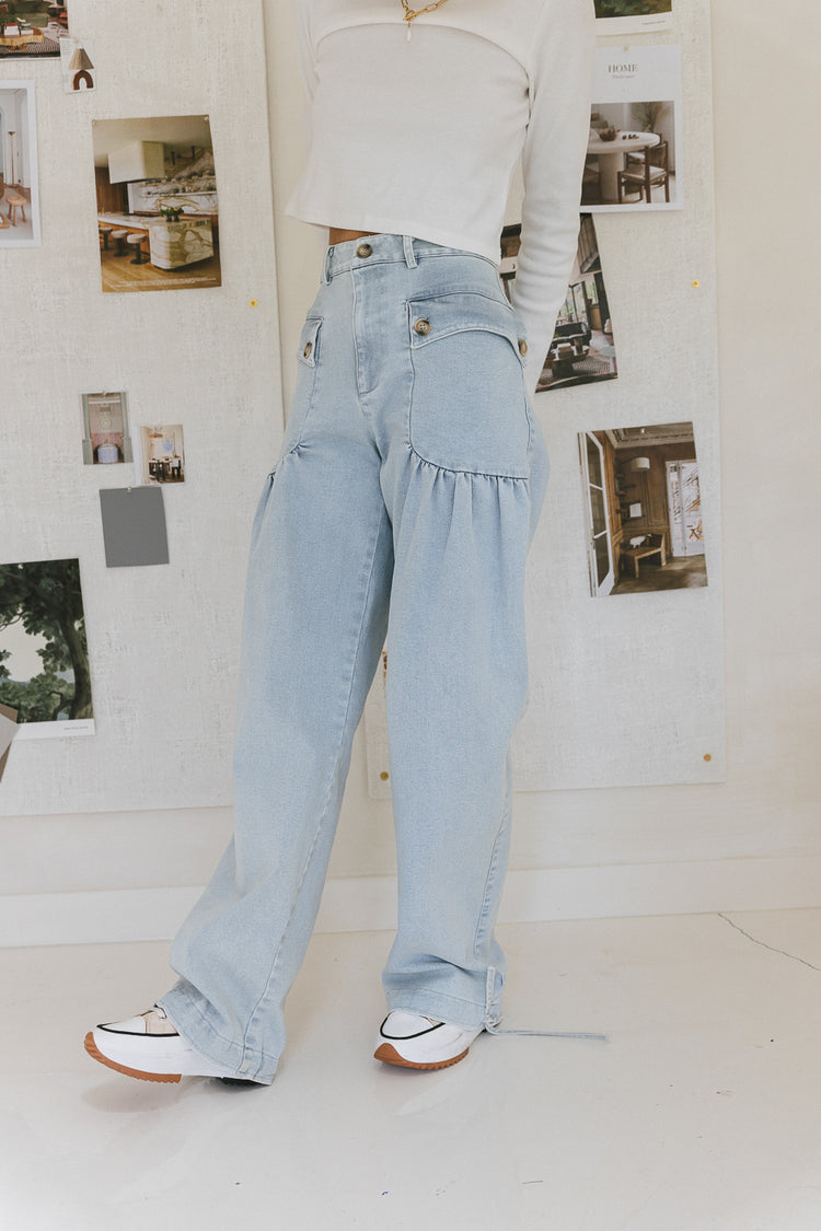 denim light wash pants with buttons