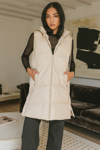 Front zipper puffer vest in cream