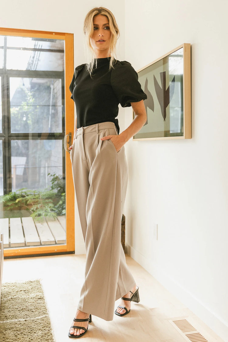 Short sleeves top in black paired with wide legs pants 