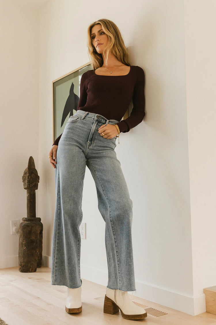 Ribbed sweater in eggplant paired with a wide leg denim 