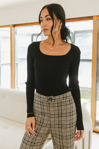 Ribbed sweater paired with a plaid pants 
