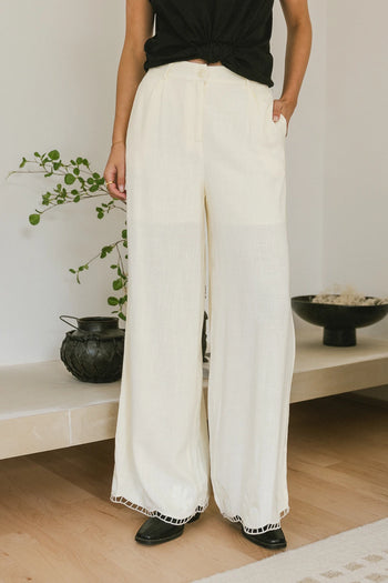 Embroidered hem pants in cream 