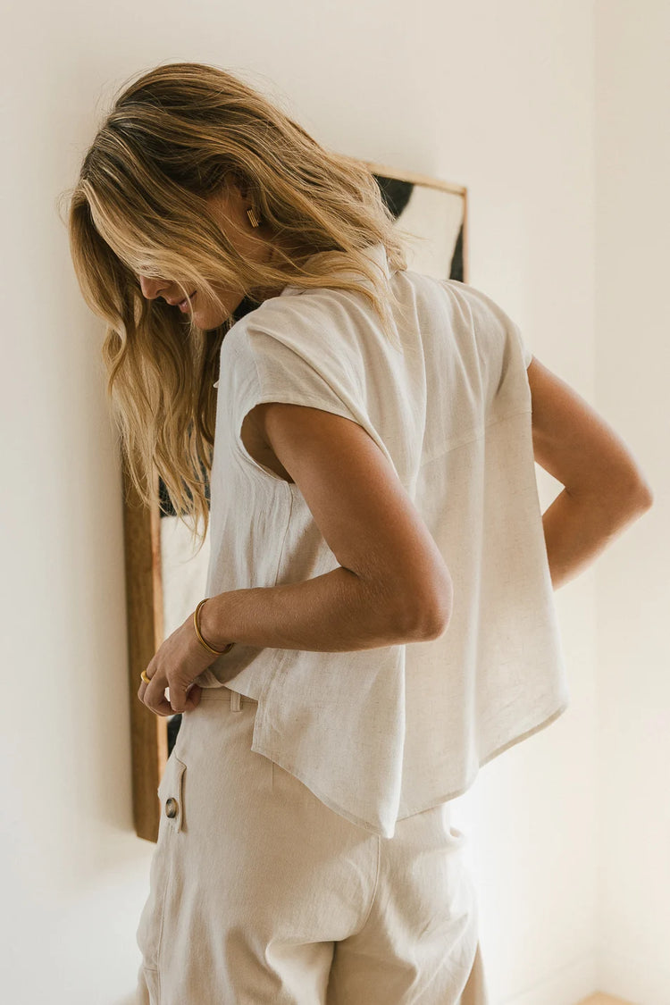 Button up in natural paired with a wide leg bottom 