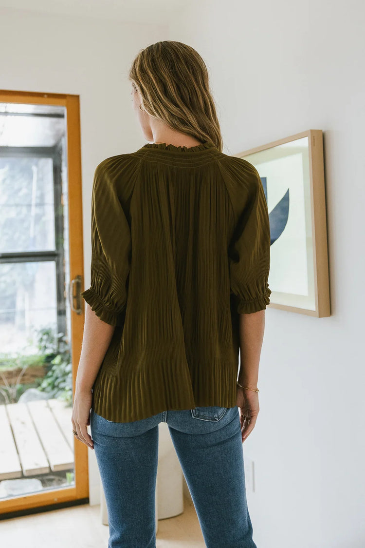 Pleated back blouse in olive 
