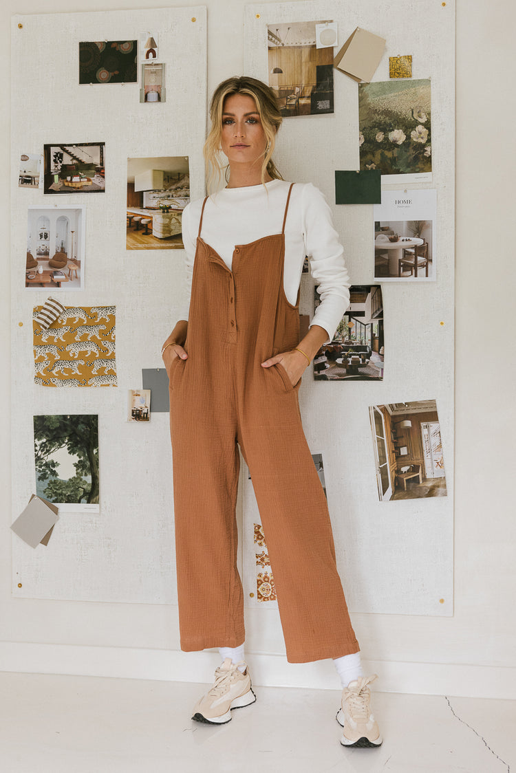 flowy rust jumpsuit with buttons