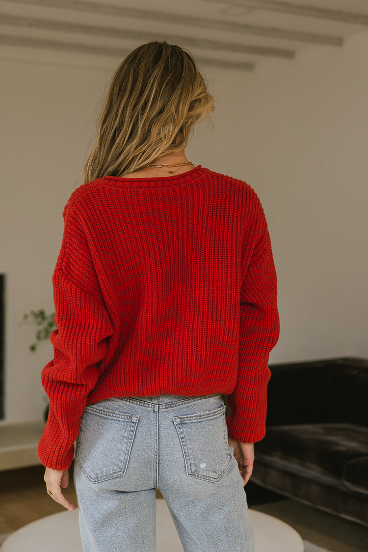 red long sleeve knit sweater