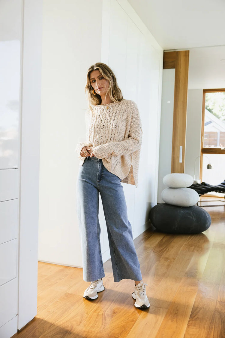 Knit sweater in natural paired with a wide leg denim 