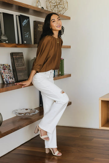 Distressed straight leg jeans in white 