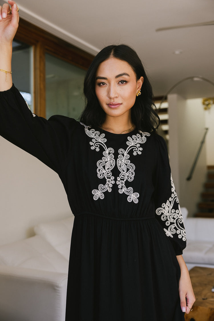 embroidered black dress