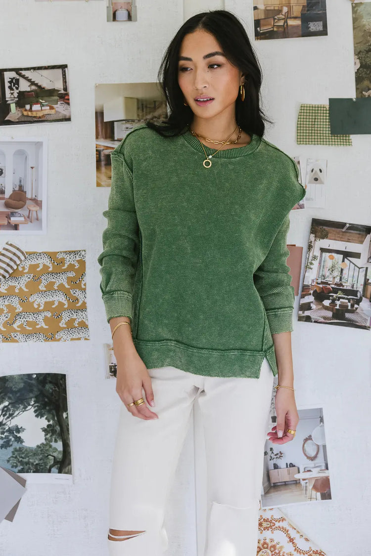 Raw hem knit top in green 