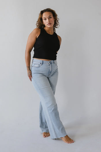 Dad jeans in light wash paired with a black tank top 