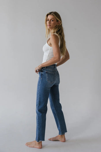 Two back pockets straight legs in medium wash 