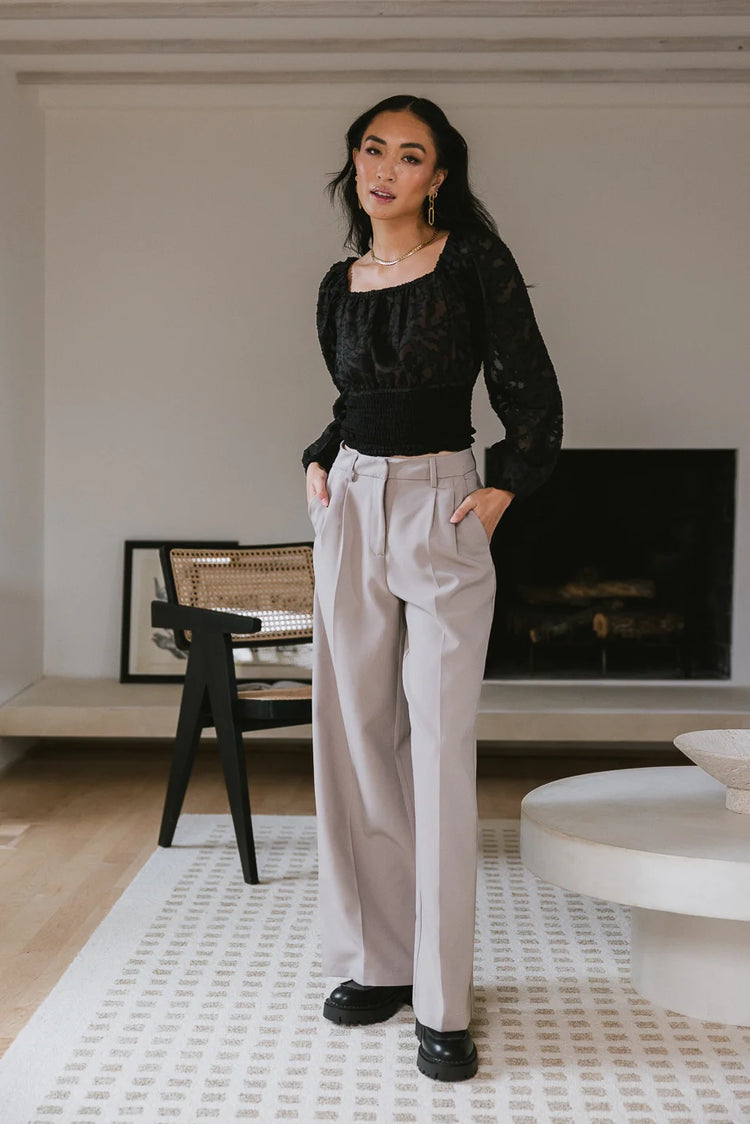 Cropped blouse paired with a wide leg pants in taupe 