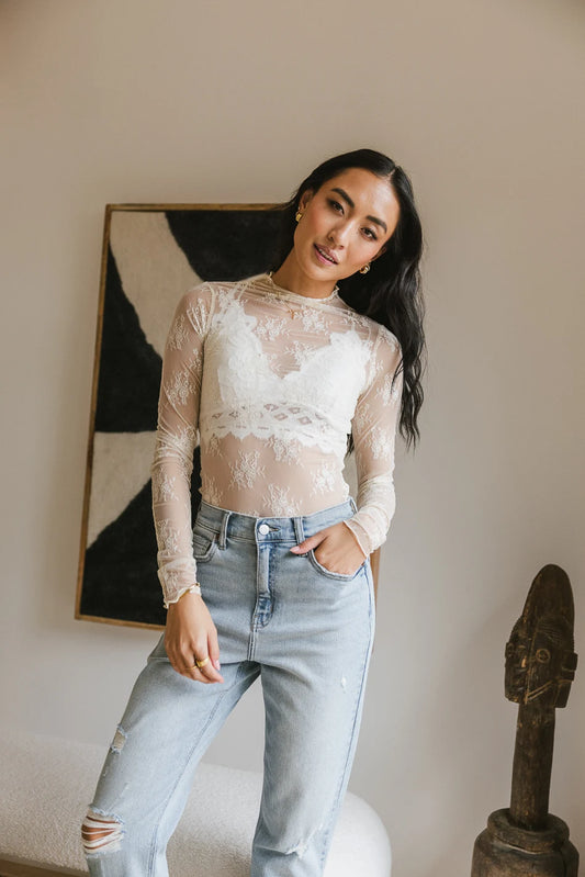 Lace top paired with a ;ight denim jean