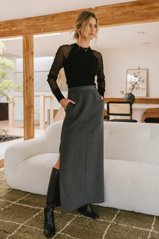 Wool skirt in grey paired with a long sleeve top 