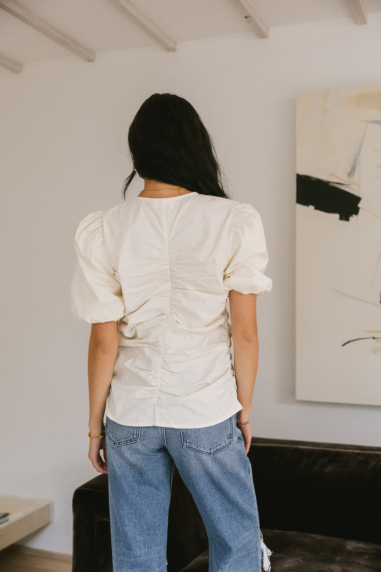 white ruched short sleeve blouse