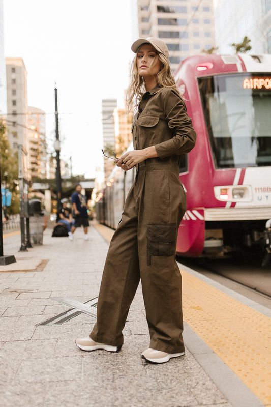 one piece jumpsuit in green with pockets