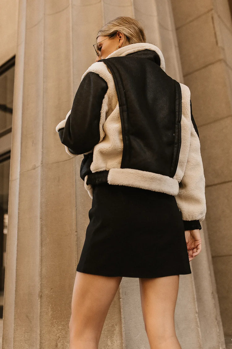 Back faux vegan jacket in black and cream 